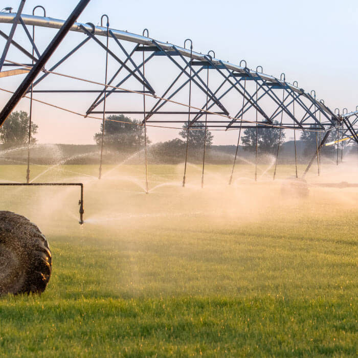 center-pivot irrigation system watering a field